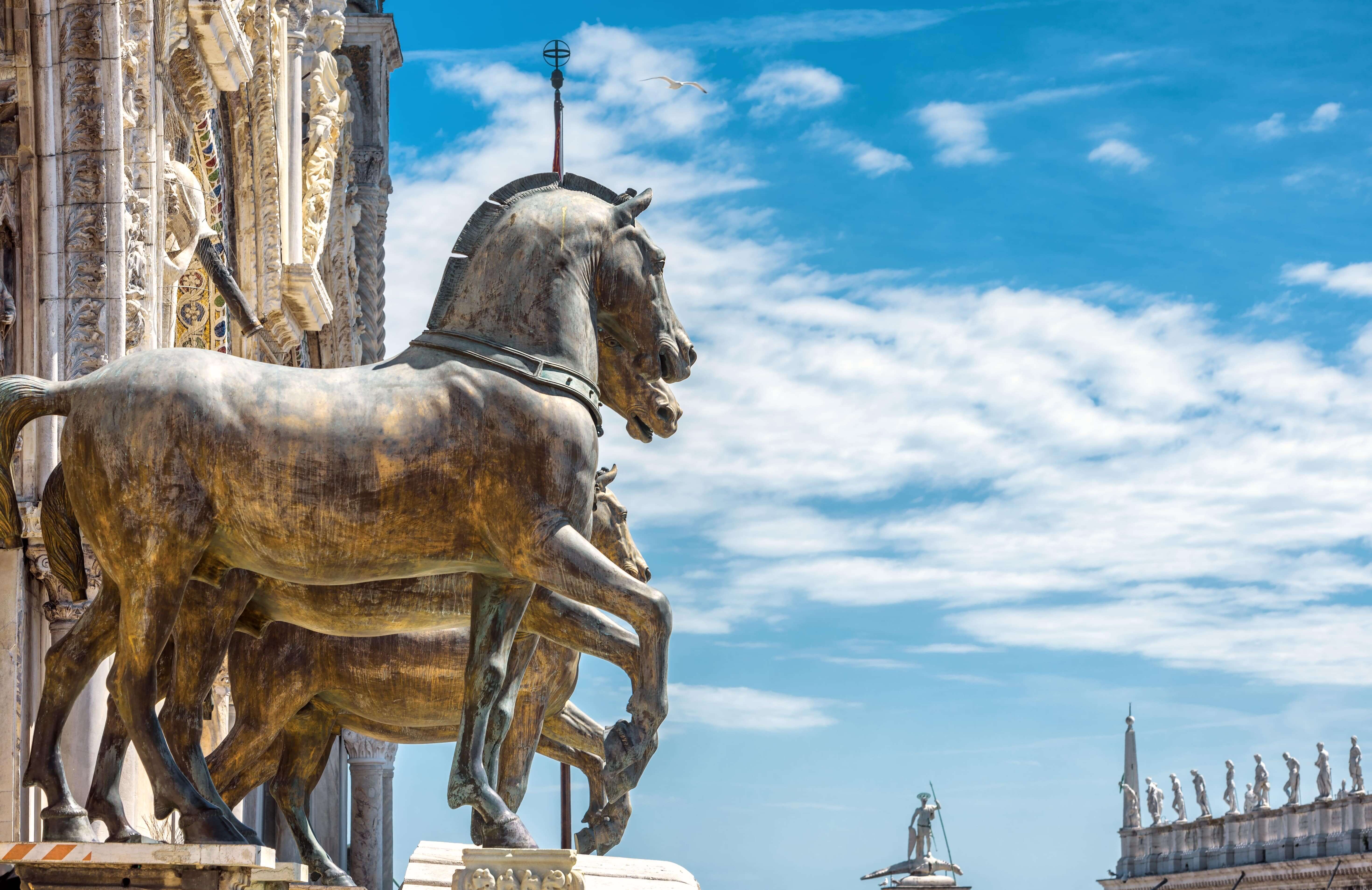 Ancient bronze horses of St Mark's Basilica over Saint Mark Square.Venice, Italy.